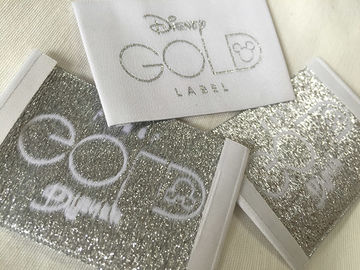 Disney-Gold-Bage-Enden-Falte gesponnene Kleidung beschriftet kalten Schnitt/Hitze-Schnitt