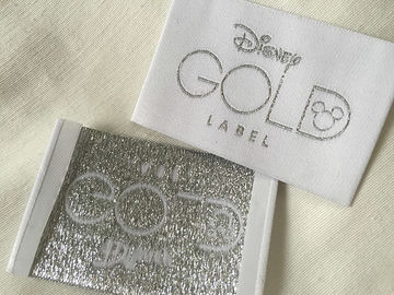 Disney-Gold-Bage-Enden-Falte gesponnene Kleidung beschriftet kalten Schnitt/Hitze-Schnitt