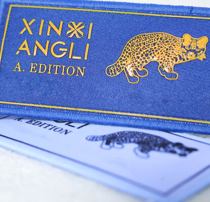 Individuell bedrucktes Stoff-Siebdrucketikett - Markenlogo-Applikation mit Leopardenmuster für Bekleidungszubehör