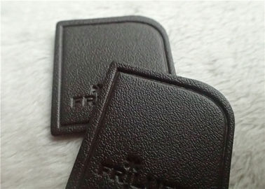 Nigger - Brown geadertes prägeartiges Lederflicken-Hochfrequenzmarken-Logo, das auf Kleid näht