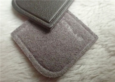Nigger - Brown geadertes prägeartiges Lederflicken-Hochfrequenzmarken-Logo, das auf Kleid näht