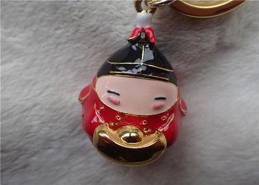 Chinesische Art-keramischer fetter Baby-Goldbarren-Schlüsselanhänger im roten Mantel