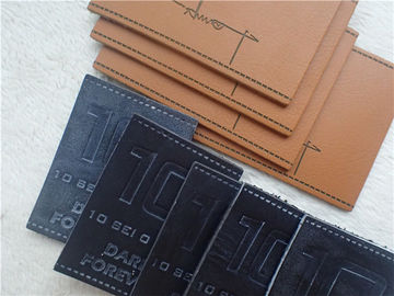 Umweltfreundliches prägeartige Logo-Flecken PUs Leder für Jeans Pantone-Farbe